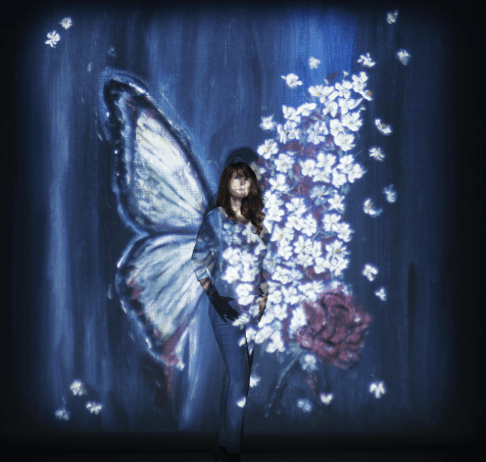 Saskia Stapel, painting Metamorphose, butterfly, John Geven photoshoot schilderij fotoshoot vlinder bloemen levensgroot shilderij